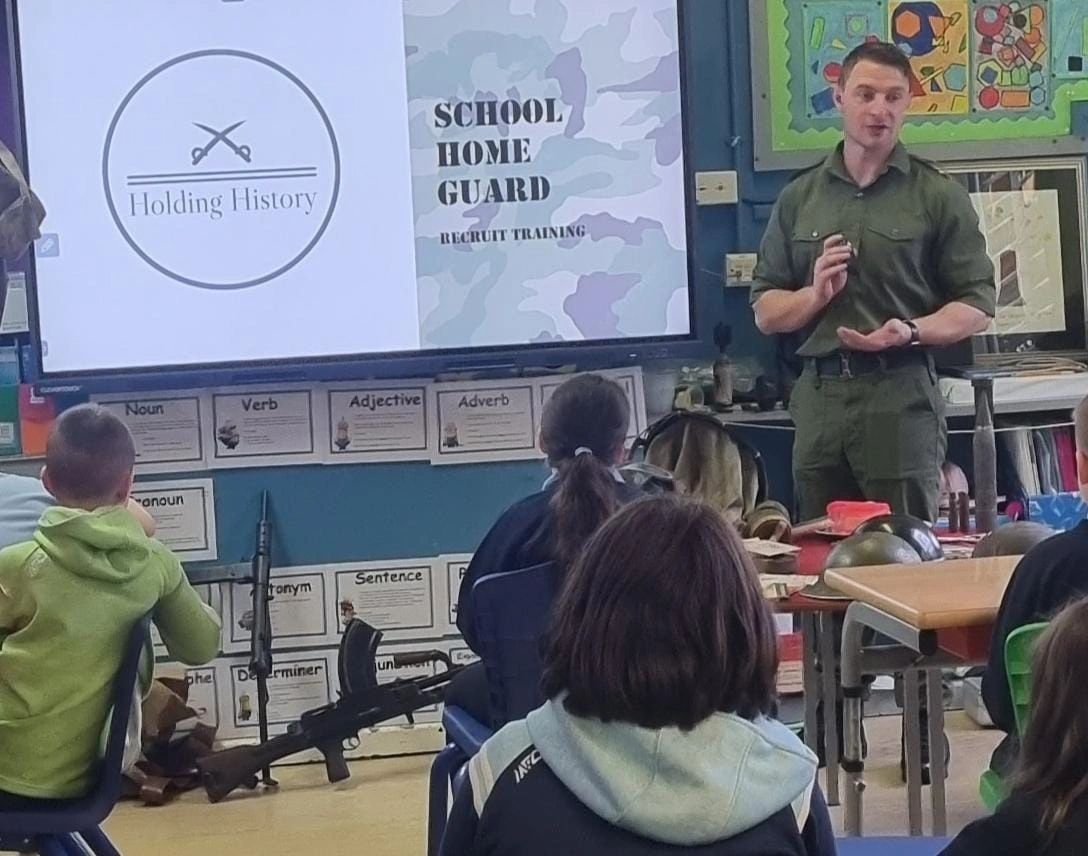 Holding History classroom session with students